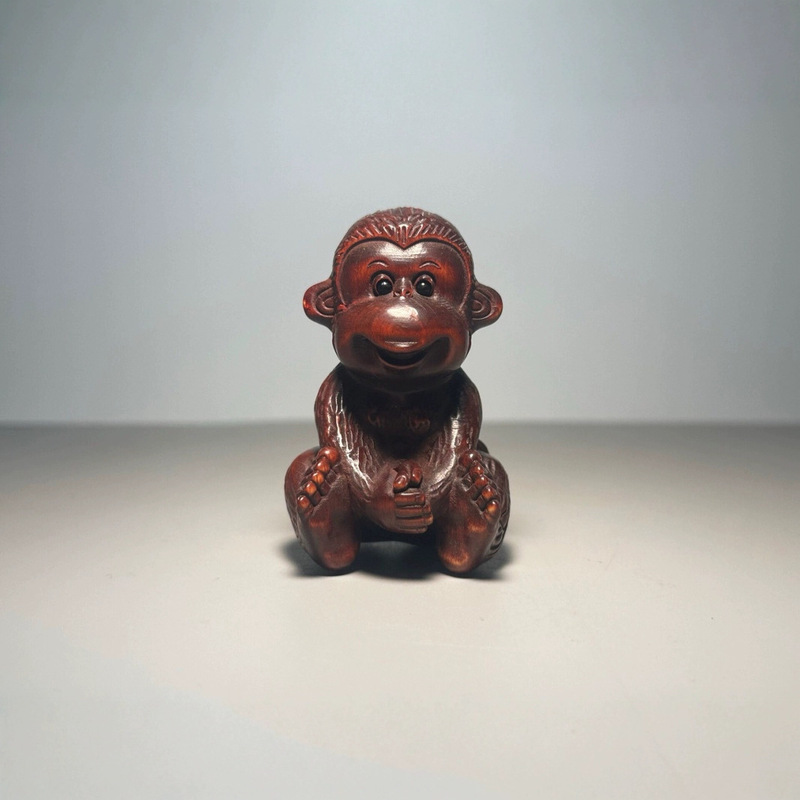 Boxwood carved monkey figurine - Phone Accessories Market ulasan dan harga